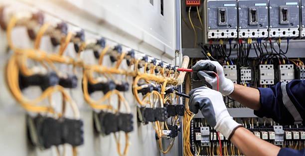 Professional Electrician technician working in Wapello, IA